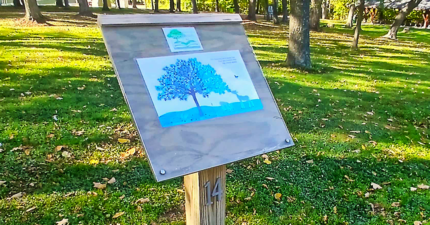 storybook sign on a trail